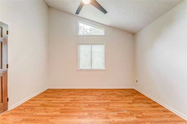 227 Margo Trl, Rome, GA 30161 - empty room featuring vaulted ceiling, light wood-style flooring, a ceiling fan, and baseboards