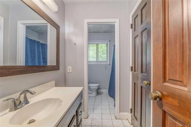 227 Margo Trl, Rome, GA 30161 - full bath with toilet, vanity, tile patterned floors, baseboards, and curtained shower