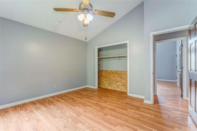 227 Margo Trl, Rome, GA 30161 - unfurnished bedroom featuring light wood finished floors, vaulted ceiling, baseboards, a closet, and a ceiling fan