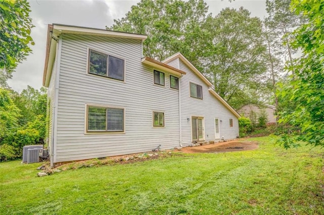227 Margo Trl, Rome, GA 30161 - back of property with a lawn and central AC