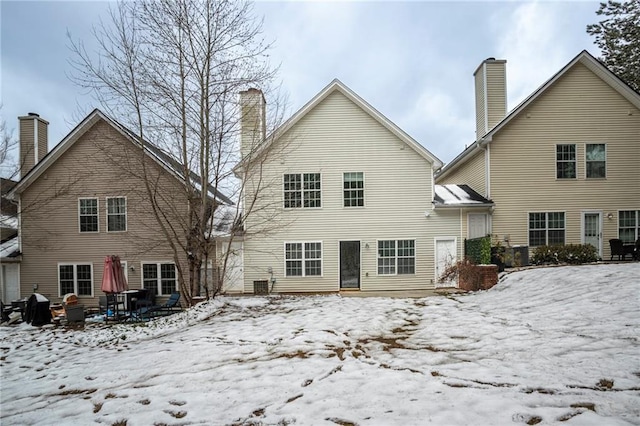 view of snow covered property