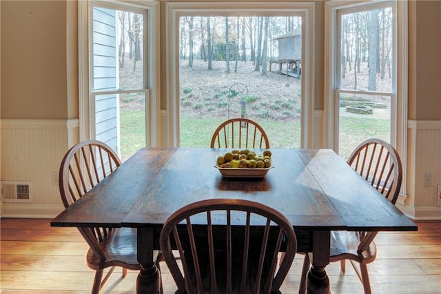 dining room with light hardwood / wood-style flooring