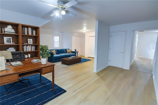 office featuring ceiling fan and light hardwood / wood-style floors