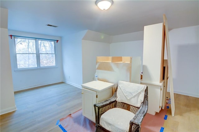 living area with light wood-type flooring