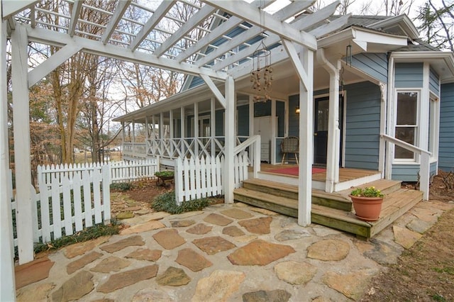 view of patio featuring a pergola and covered porch