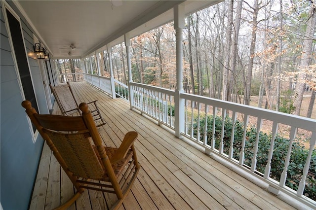 wooden deck featuring covered porch