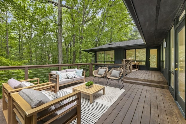 wooden deck featuring outdoor lounge area