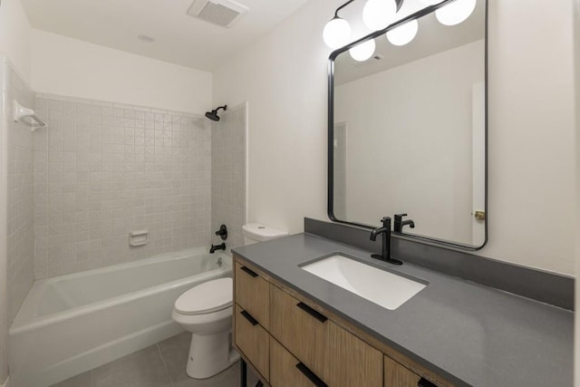 bathroom with visible vents, tile patterned flooring, vanity, toilet, and washtub / shower combination