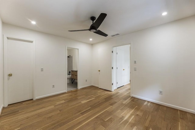 unfurnished bedroom with recessed lighting, baseboards, visible vents, and light wood-type flooring