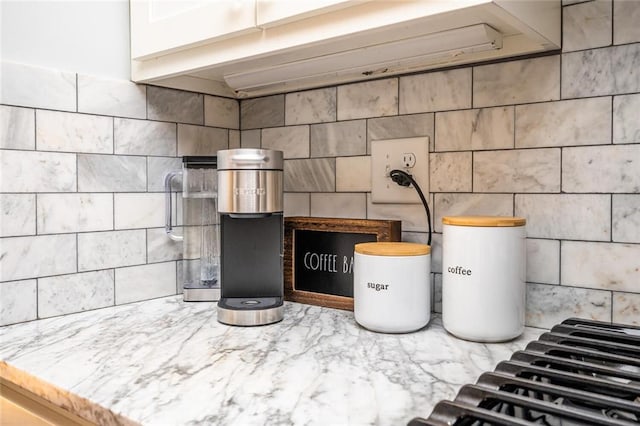 interior details featuring tasteful backsplash