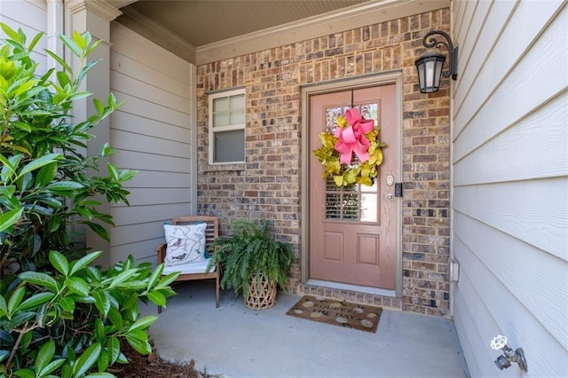 doorway to property with covered porch