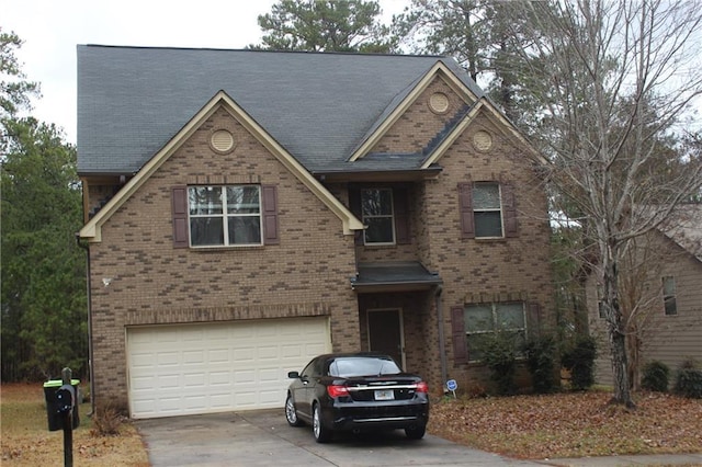 view of front of property featuring a garage