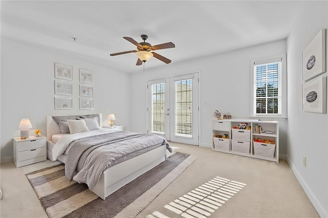 bedroom with access to outside, baseboards, french doors, and light colored carpet