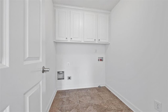 laundry room featuring hookup for an electric dryer, washer hookup, baseboards, and cabinet space