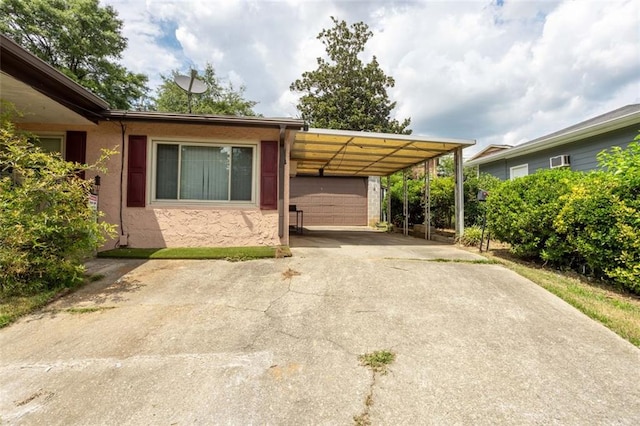 view of front of house featuring a carport and a garage