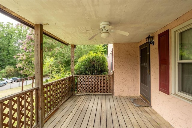 wooden terrace with ceiling fan