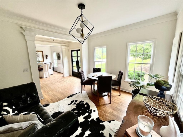 8525 Anchor On Lanier Ct, Gainesville, GA 30506 - dining room with decorative columns, crown molding, light wood-style flooring, and baseboards