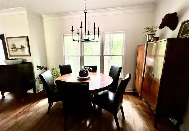 8525 Anchor On Lanier Ct, Gainesville, GA 30506 - dining space with a chandelier, wood finished floors, ornamental molding, and baseboards