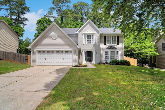 view of front of home featuring driveway and an attached garage