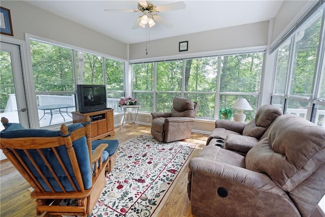 sunroom / solarium with ceiling fan