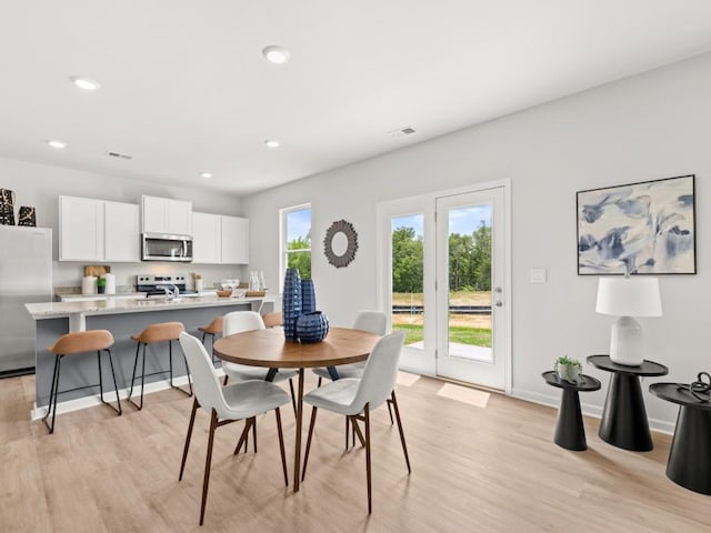 414 Oak View Ln, Dallas, GA 30157 - dining room with light wood-type flooring and recessed lighting