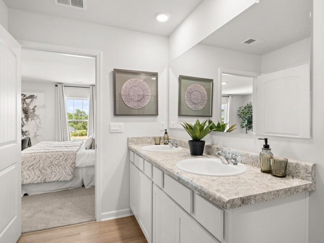 414 Oak View Ln, Dallas, GA 30157 - full bath featuring ensuite bathroom, double vanity, wood finished floors, and recessed lighting