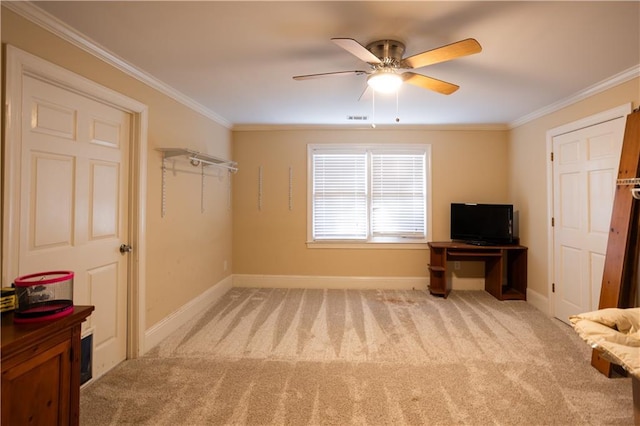 living area featuring carpet floors, ceiling fan, and ornamental molding