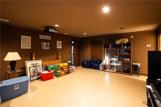rec room featuring recessed lighting and ornamental molding