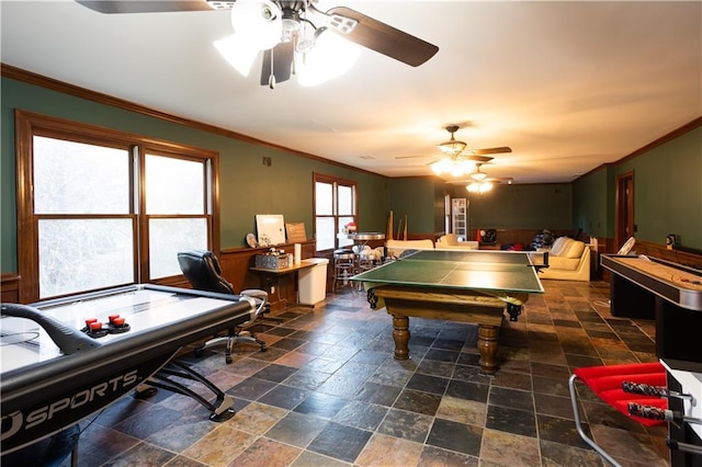 rec room with crown molding, ceiling fan, billiards, and stone tile flooring