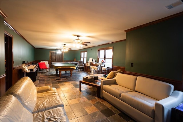 living room with visible vents, ornamental molding, stone tile flooring, a ceiling fan, and billiards