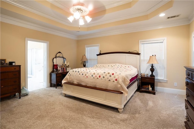 bedroom featuring light carpet, a raised ceiling, crown molding, ceiling fan, and multiple windows