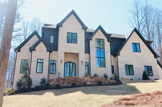 view of front of property featuring brick siding