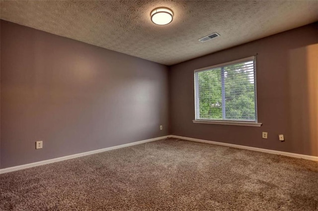 924 Park Gate Pl, Stone Mountain, GA 30083 - carpeted spare room featuring a textured ceiling and baseboards
