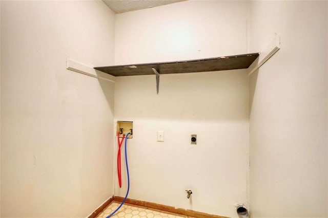 924 Park Gate Pl, Stone Mountain, GA 30083 - laundry room featuring washer hookup, baseboards, and electric dryer hookup