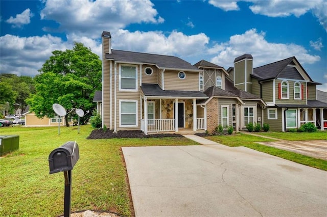 924 Park Gate Pl, Stone Mountain, GA 30083 - view of front of home featuring covered porch, a chimney, and a front yard