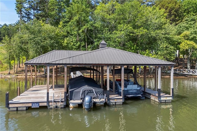1132 N Edgewater Trl, Toccoa, GA 30577 - dock area with boat lift, a water view, and view of scattered trees