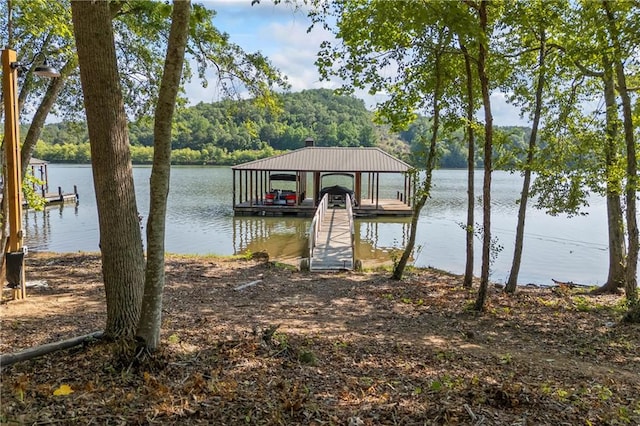 1132 N Edgewater Trl, Toccoa, GA 30577 - dock with a water view, a forest view, and boat lift