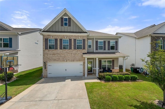 1570 Ribbon Mill Ln SW, Mableton, GA 30126 - craftsman house with brick siding, board and batten siding, concrete driveway, a garage, and a front yard