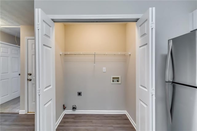 clothes washing area featuring laundry area, washer hookup, dark wood finished floors, and hookup for an electric dryer