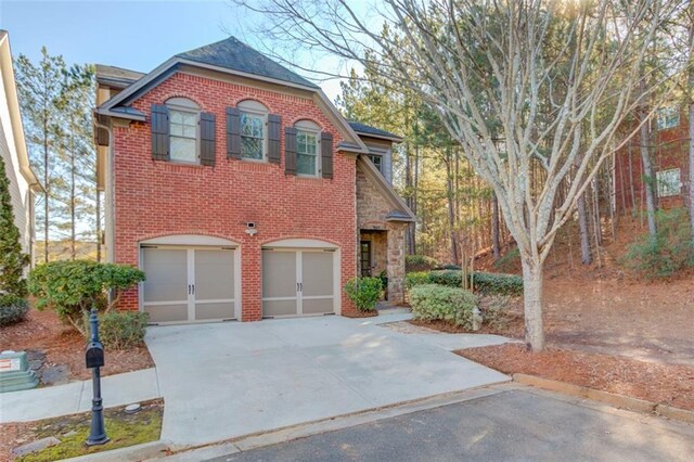 view of front of property with a garage