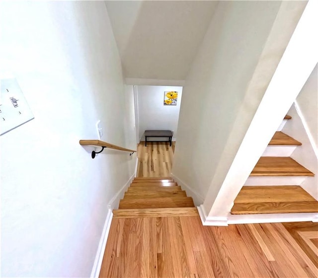 6914 Fairway Trl, Austell, GA 30168 - stairs with baseboards and wood finished floors