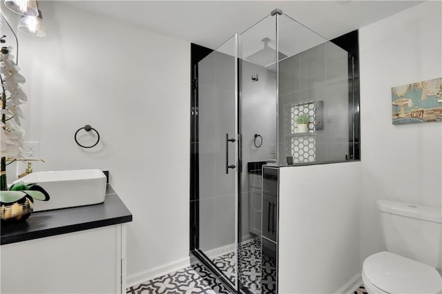 6914 Fairway Trl, Austell, GA 30168 - full bath featuring toilet, vanity, a stall shower, and baseboards