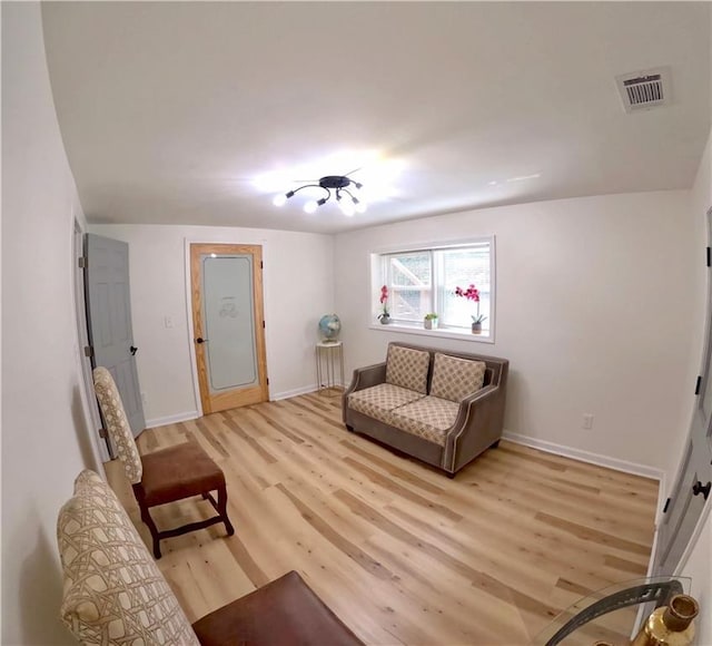 6914 Fairway Trl, Austell, GA 30168 - living area with light wood finished floors, baseboards, and visible vents