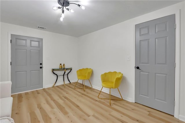 6914 Fairway Trl, Austell, GA 30168 - sitting room featuring light wood-style flooring, baseboards, and visible vents