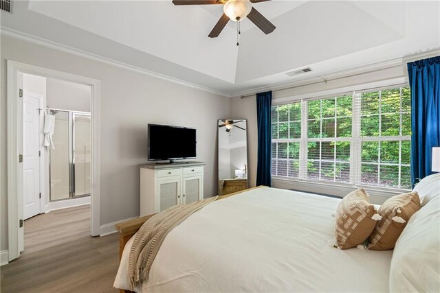 3088 Steeplechase Dr, Alpharetta, GA 30004 - bedroom with visible vents, wood finished floors, baseboards, ornamental molding, and a tray ceiling