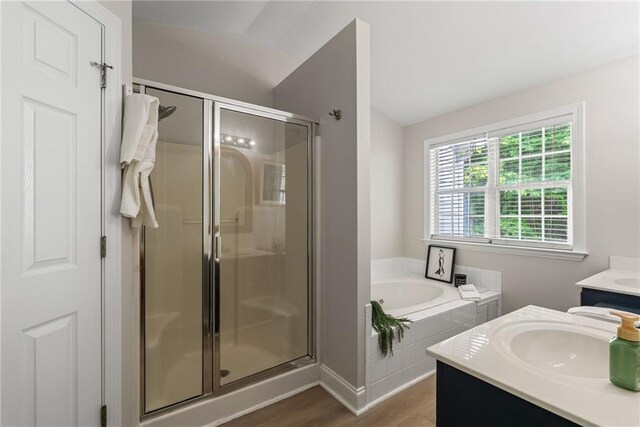 3088 Steeplechase Dr, Alpharetta, GA 30004 - bathroom featuring vanity, a stall shower, a bath, and wood finished floors