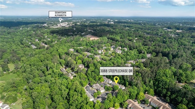 3088 Steeplechase Dr, Alpharetta, GA 30004 - drone / aerial view with a wooded view