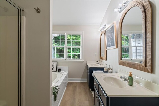 3088 Steeplechase Dr, Alpharetta, GA 30004 - bathroom featuring a sink, baseboards, a shower stall, two vanities, and a bath
