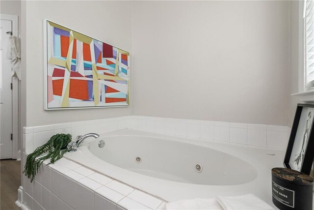 3088 Steeplechase Dr, Alpharetta, GA 30004 - bathroom with a tub with jets and wood finished floors