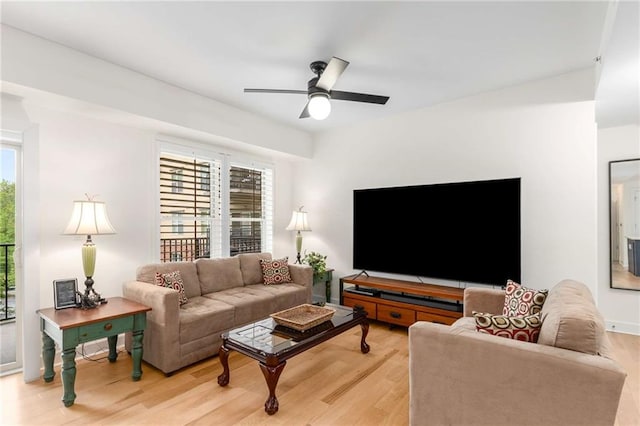 200 River Vista Dr Unit 426, Atlanta, GA 30339 - living area with ceiling fan and light wood-style floors
